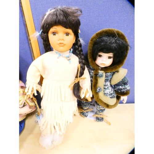 49 - Group of dolls to include a boxed Regency Fine Arts 'Pride and Joy' doll, another near-matching doll... 