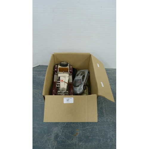 57 - Carton containing model cars to include Burago and other makers.