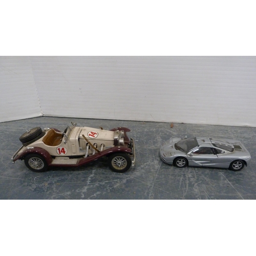 57 - Carton containing model cars to include Burago and other makers.