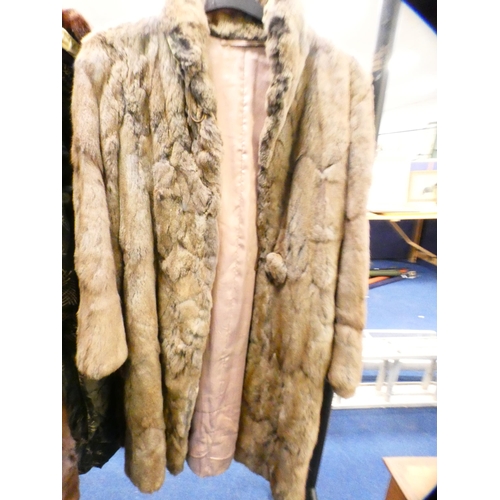 66 - Group of ladies' simulated fur coats to include examples retailed by John Logan of Glasgow.  (6)