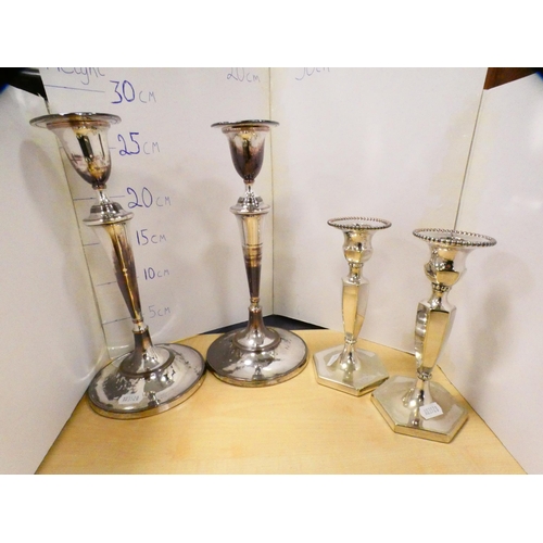 70 - Collection of EP and plated wares to include two pairs of candlesticks, classical-style bowl, sauce ... 