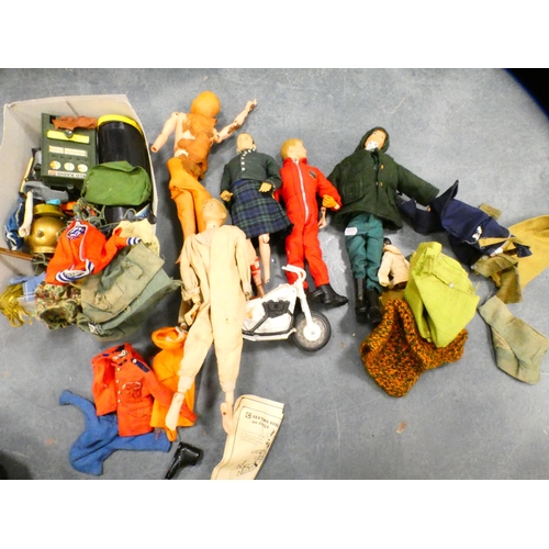 73 - Collection of Action Man figures with clothing and accessories, and another figure.