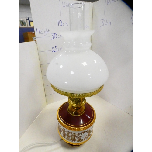 78 - Modern Italian table lamp in the form of an oil lamp with classical decoration.