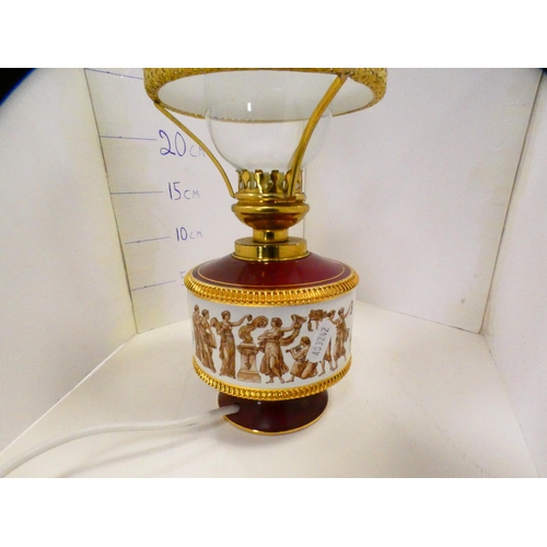 78 - Modern Italian table lamp in the form of an oil lamp with classical decoration.