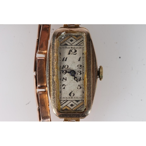 464 - Ladies 9ct gold cased cocktail wristwatch having 15 jewel Swiss movement on 9ct gold expanding brace... 