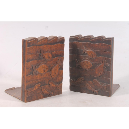 10 - Pair of carved oak fish design bookends, a painted letter rack in the form of a cat, a pair of Londo... 