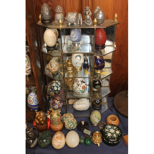 15 - Large collection of eggs to include OC & Co porcelain trinket boxes, malachite, onyx and other h... 