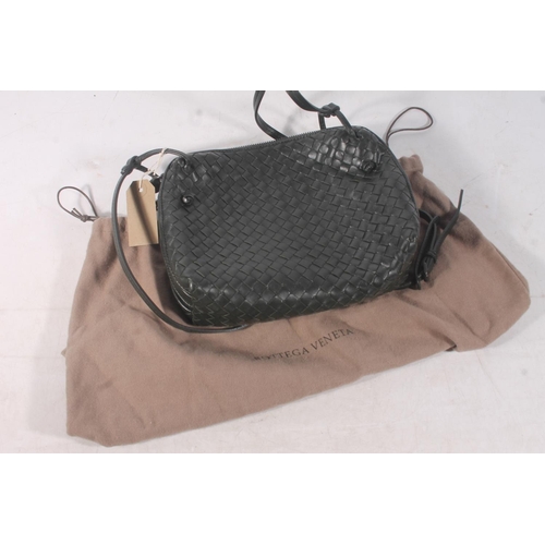 38 - Italian designer dark green leather shoulder bag by Bottega Veneta, with matching handbag mirror.