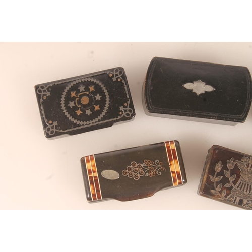 57 - Five antique papier mache or horn snuff boxes, the largest 7cm long. (5)