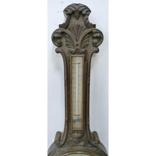 221 - Edward & Sons of Glasgow carved mahogany banjo barometer with thermometer gauge above a signed d... 
