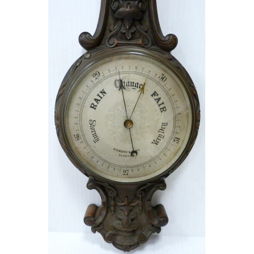 221 - Edward & Sons of Glasgow carved mahogany banjo barometer with thermometer gauge above a signed d... 