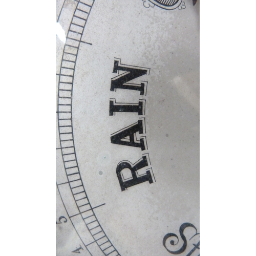 221 - Edward & Sons of Glasgow carved mahogany banjo barometer with thermometer gauge above a signed d... 