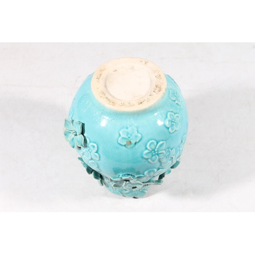 67 - Studio pottery floral blue glaze vase, H18cm.