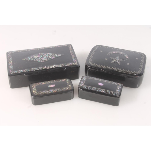 46 - Four Victorian black lacquered papier mache snuff boxes with inlaid abalone shell decoration, the la... 