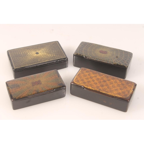 50 - Four antique black lacquered papier mache snuff boxes with gilt design top covers, the largest 9cm l... 