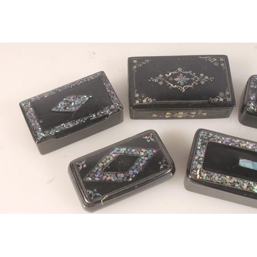 51 - Five Victorian black lacquer papier mache snuff boxes inset with abalone shell designs, the largest ... 