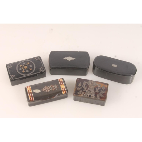 57 - Five antique papier mache or horn snuff boxes, the largest 7cm long. (5)