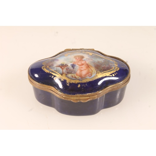 60 - French Sevres porcelain trinket box of quatrefoil form, the top with vignette depicting a cherub wit... 