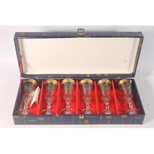 66 - Cased set of gilt enamel Italian wine glasses.