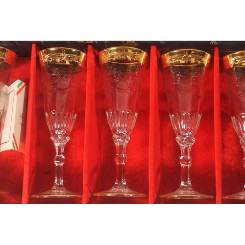 66 - Cased set of gilt enamel Italian wine glasses.