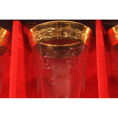 66 - Cased set of gilt enamel Italian wine glasses.