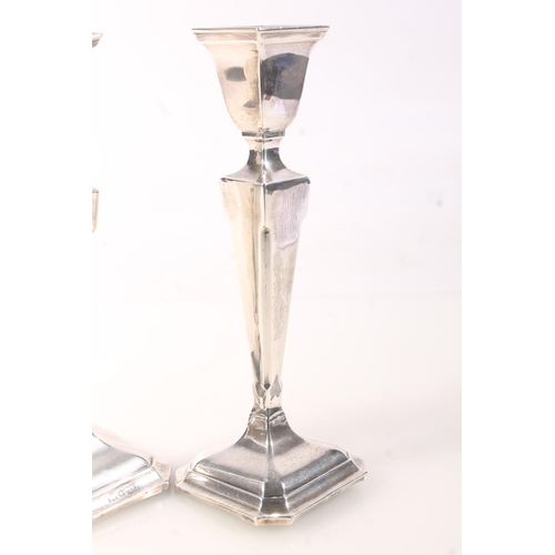 427C - Pair of Arts & Crafts era silver candlesticks by AW, Chester 1923, 18cm tall.