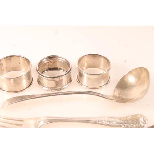 427K - Hallmarked silver napkin rings, ladles etc. gross 217g.