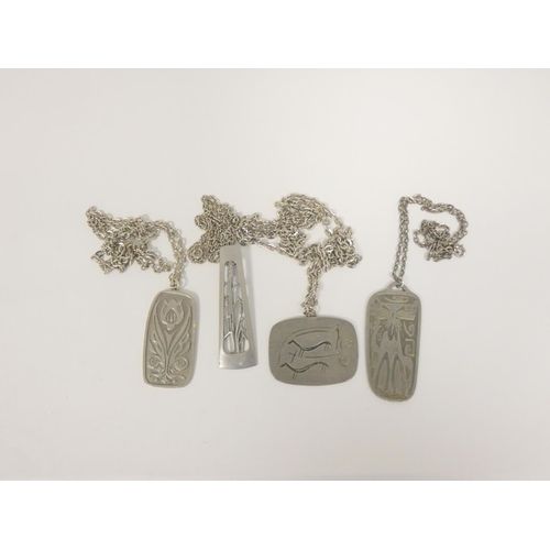 55 - Four Jorgen Jensen pewter plaque pendants.