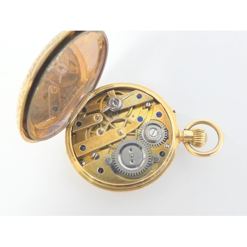 58 - Geneva keyless cylinder watch in gold half hunter case, engraved with enamel chapter 'K18', 30mm, li... 