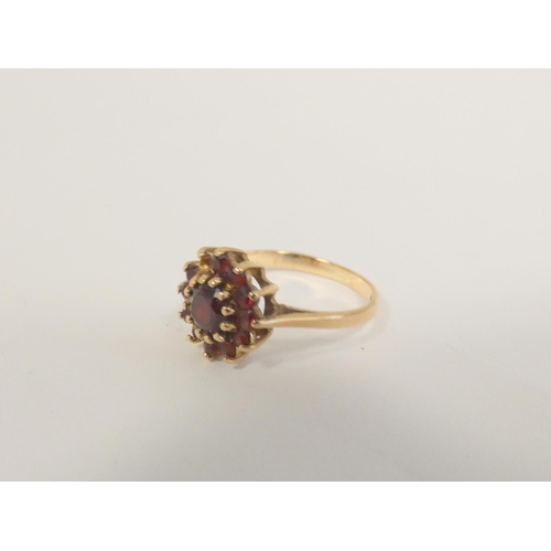 63 - Early 19th century gold ring with pyrope garnets and another 9ct gold, 1924.