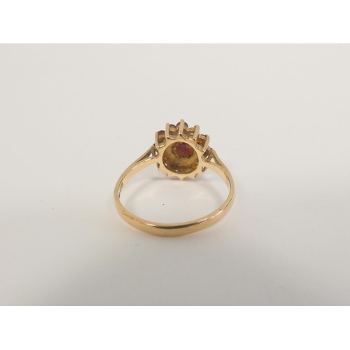 63 - Early 19th century gold ring with pyrope garnets and another 9ct gold, 1924.