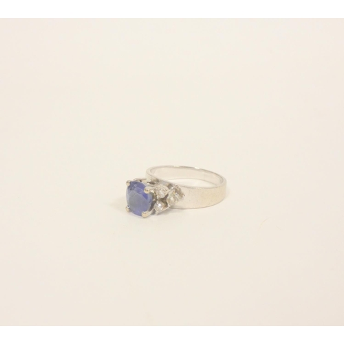 88 - Diamond and ceylon sapphire ring in 14ct gold '585', 5.6g gross, size 'N'.