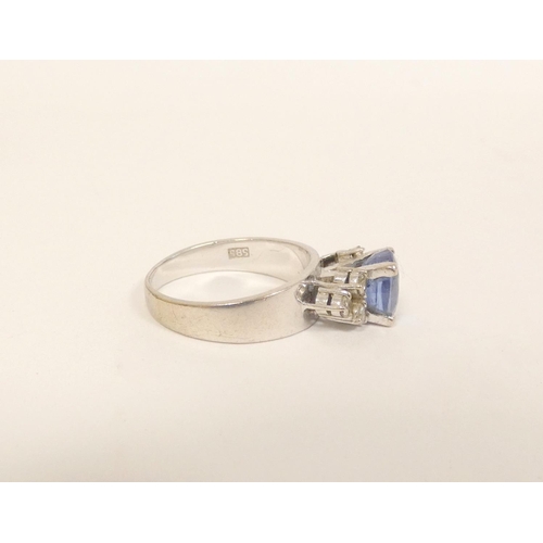 88 - Diamond and ceylon sapphire ring in 14ct gold '585', 5.6g gross, size 'N'.