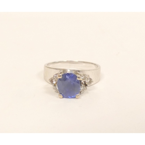 88 - Diamond and ceylon sapphire ring in 14ct gold '585', 5.6g gross, size 'N'.