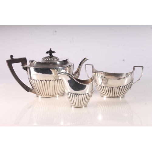 36 - Victorian silver three piece tea service, the teapot with ebonized handle and finial over a half lob... 