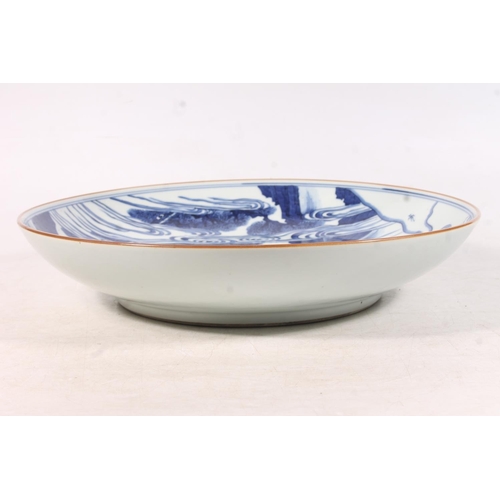 437 - Chinese Kangxi style blue and white charger, Painted with a scene of figures looking up at an immort... 