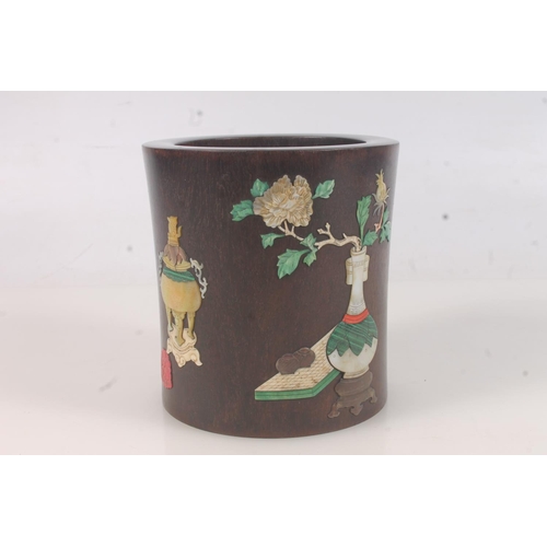 438 - Chinese hardwood brush pot, Inlaid with mother of pearl and hardstone, bearing an urn, vase on stand... 