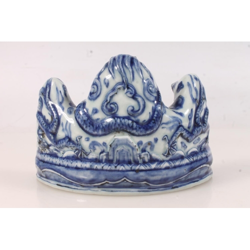 440 - Chinese blue and white dragon brush rest, moulded with the five claw dragon, extended six character ... 