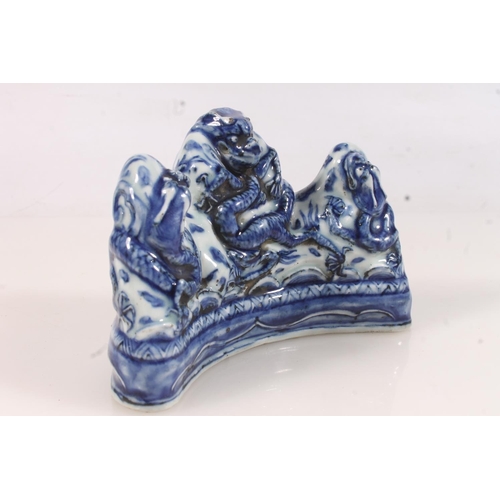 440 - Chinese blue and white dragon brush rest, moulded with the five claw dragon, extended six character ... 
