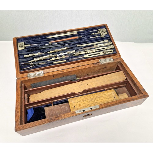 34 - Walnut cased drawing instrument set