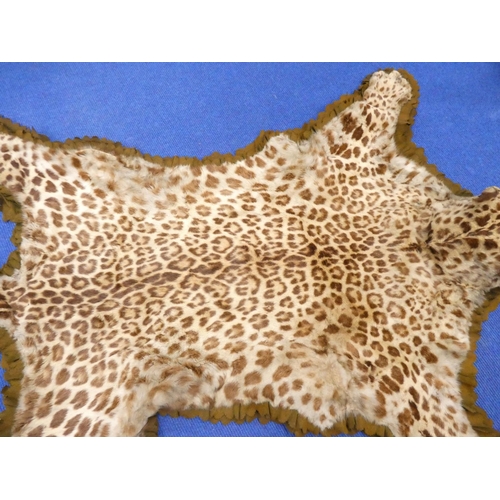 Victorian leopard skin rug, with mounted and worked head with inset ...