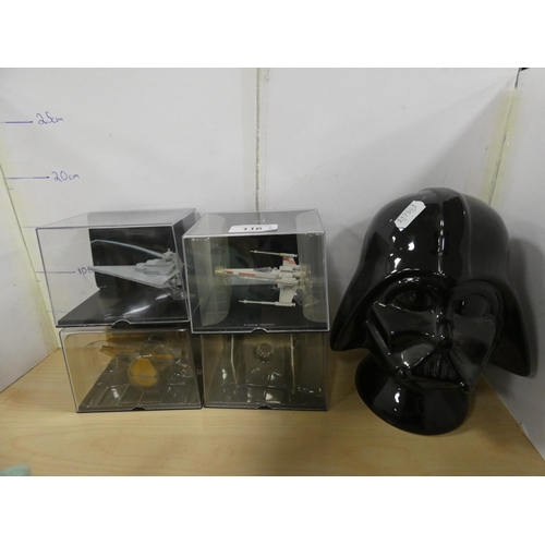 116 - Group of model Star Wars collectables contained in small display cases to include Star Destroyer, Ro... 