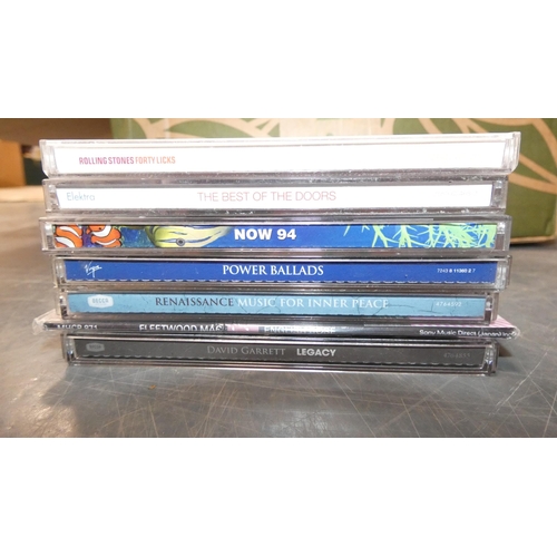 67 - Carton containing various vinyl records and CDs to include The Beatles Rubber Soul, Rolling Stones, ... 