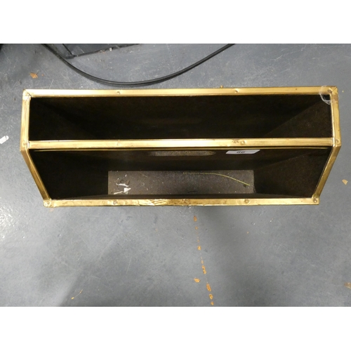 86 - Brass-coated magazine rack.