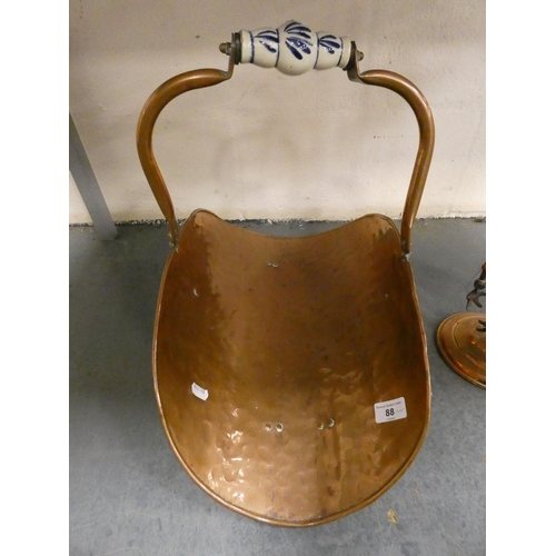 88 - Copper coal depot with Delft-style handle, and a copper companion stand with fire irons.