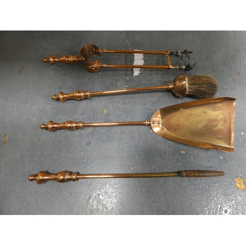 88 - Copper coal depot with Delft-style handle, and a copper companion stand with fire irons.