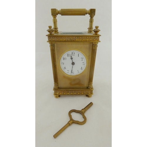 223 - French brass four glass carriage clock, c. 1900, with glazed viewing panel to the top showing the es... 