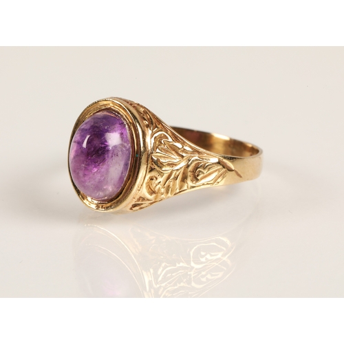 72 - 9ct gold ring set with an amethyst cabochon, ring size W, 3.3g