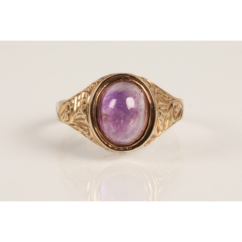 72 - 9ct gold ring set with an amethyst cabochon, ring size W, 3.3g