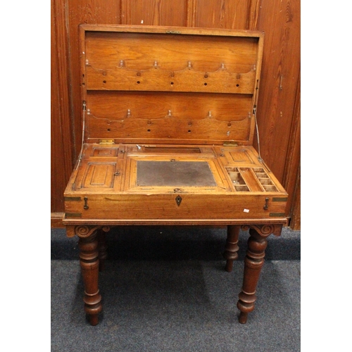 485 - Antique mahogany brass bound campaign table, the top opening to reveal a fitted interior, all raised... 